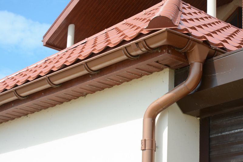 eave of a roof with gutters